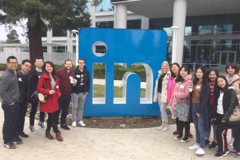 A group of BHGAP students posing in front of the Linkedin sign at the headquarters in Sunnyvale. 