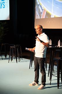 Matthieu Bonenfant onstage addressing a crowd