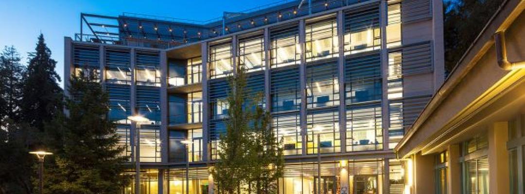 Haas School of Business at night, windows lit up