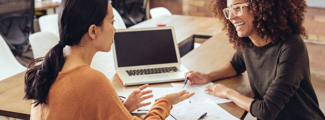 Young businessperson meeting with her mentor