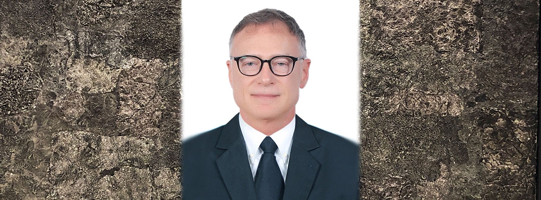 Certificate Program in Finance instructor Powell Cappel in dark business suit, white background