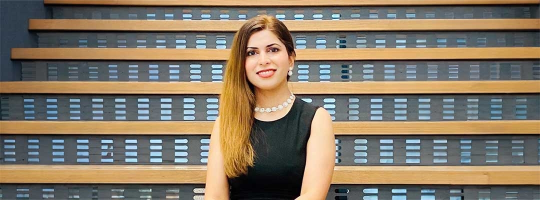 Photo of Vrushali Patki sitting on steps with interesting background