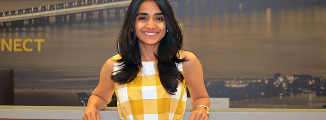 Ankita Mantri confidently leaning on table