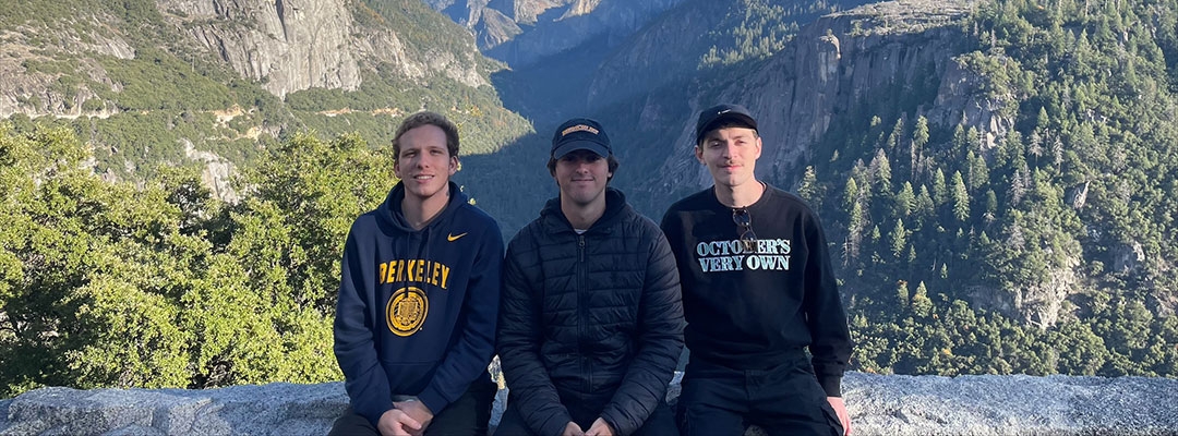 Eduardo Fatio and friends taking a photo in front of picturesque Yosemite National Park