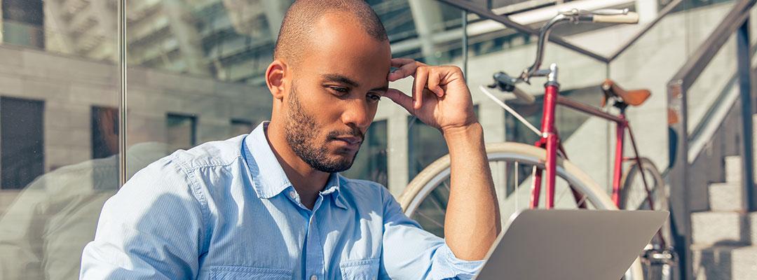 Stock photo of career changer looking at job listings