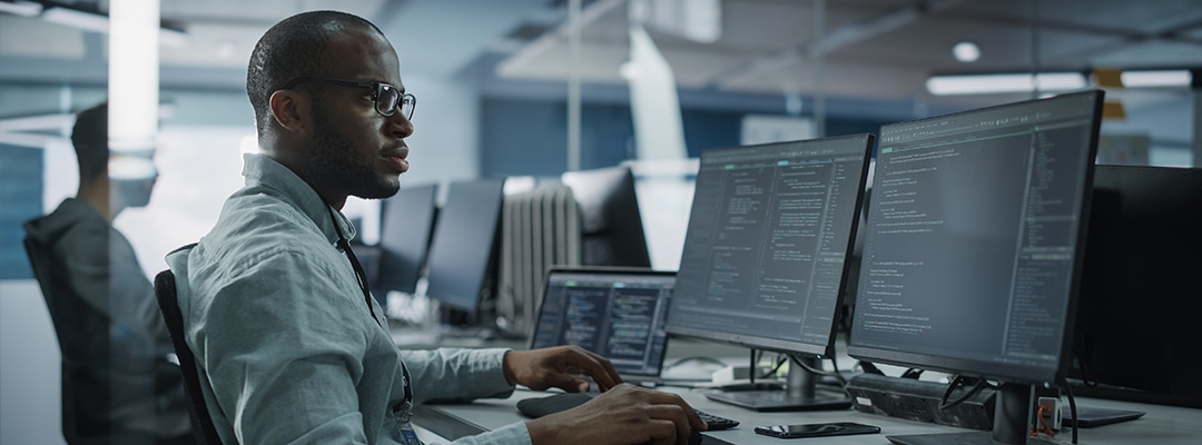 Stock photo of programmer at work