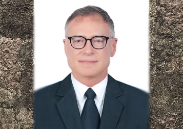 Certificate Program in Finance instructor Powell Cappel in dark business suit, white background