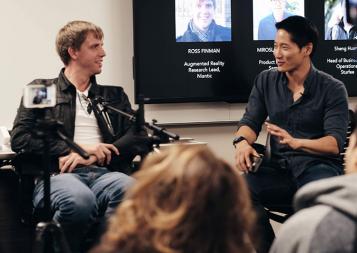 Photo of panelist Ross Finman and moderator Sheng Huang