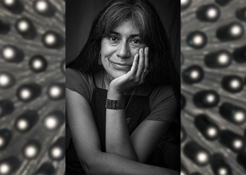 Headshot of Claudia Huenchuleo Paquien with artwork behind