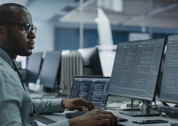 Stock photo of programmer at work