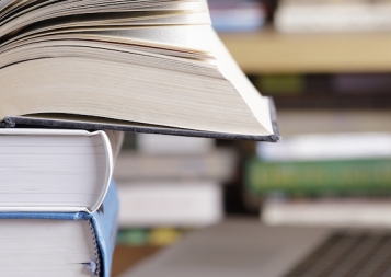 books stacked on top of each other