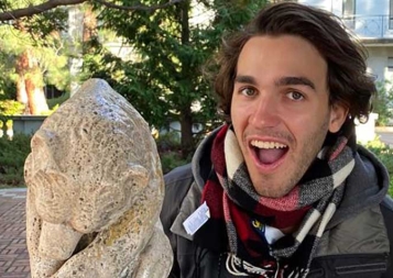 Marcelo Reis taking a selfie with a Cal Bear