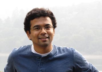 Business Adminstration certificate graduate Srikanth Kannan leaning at an overlook