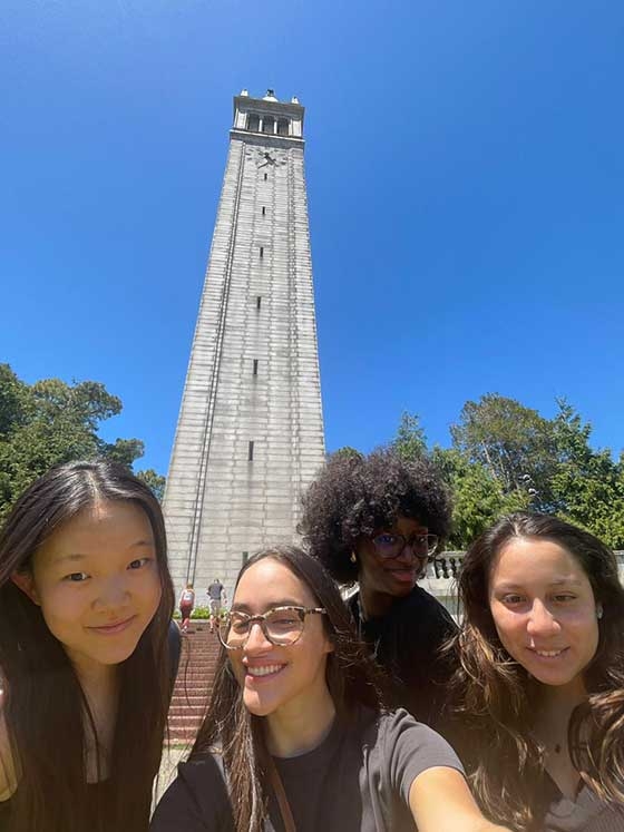 Mariane Iman Ndiaye and friends in front of the Berkeley Campanile tower