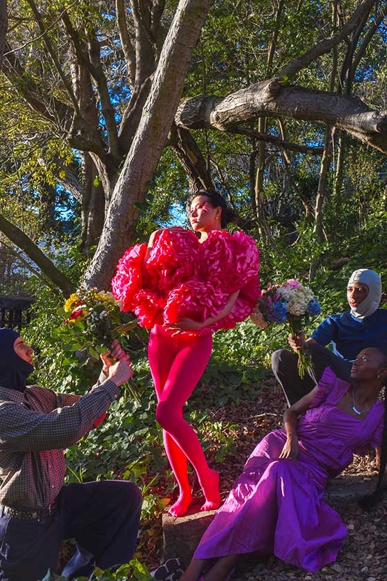 Mariane Iman Ndiaye modeling in front of Berkeley trees