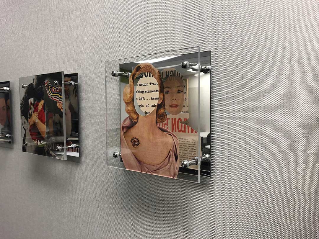 Shannon Milar photo of recent art work that has floating magazine cutouts between clear acrylic sheets and fastened to mirrors