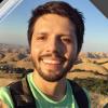 Juan Campos selfie in front of a desert background